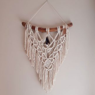 Tapiz bohemio con plumas