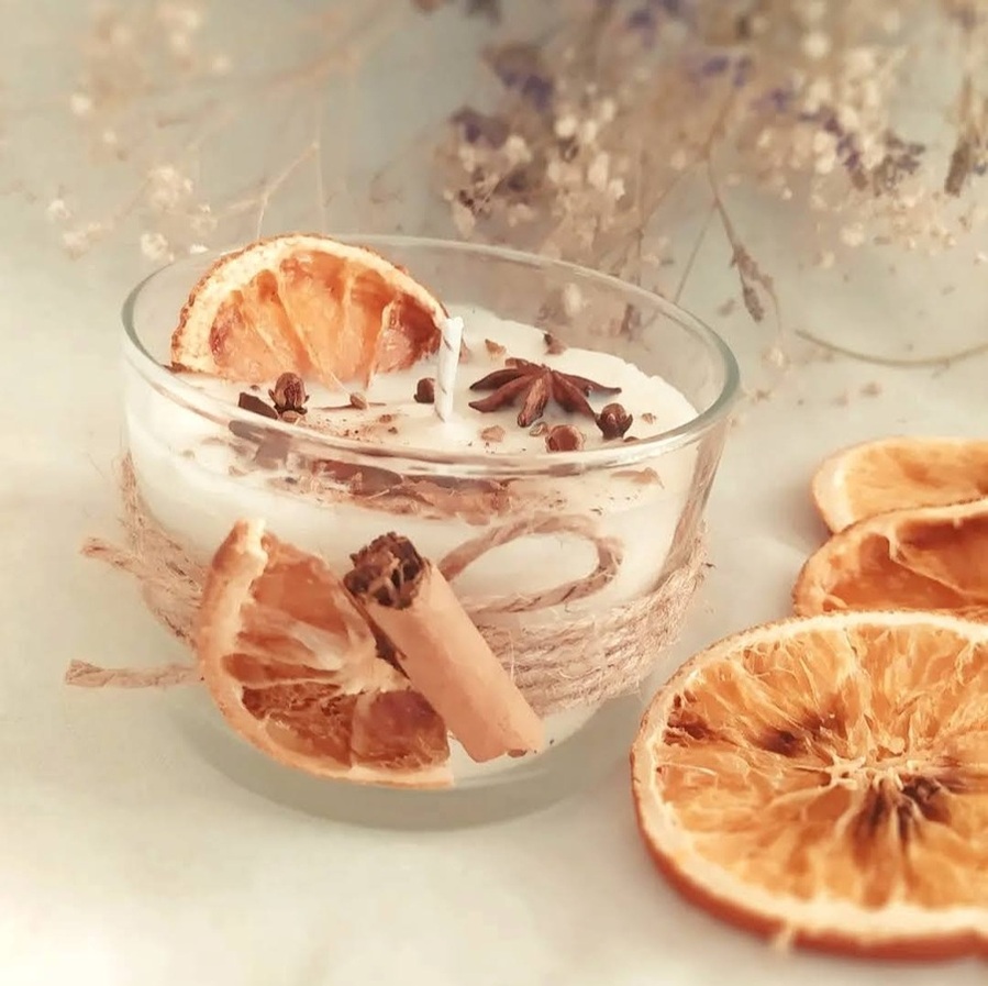 Vela artesanal aromática de Naranja y Canela en vaso de cristal